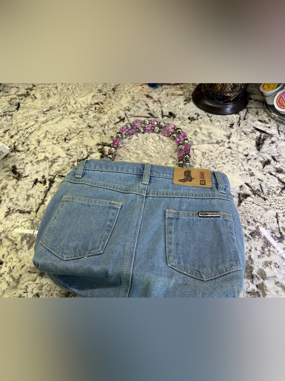 Q2  Denim jean purse with Pink Beaded Handle pink and white polkadot interior.